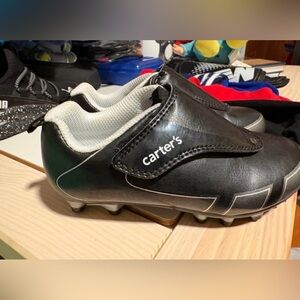 Carter's Black Youth Soccer Cleats with 10t accessories included